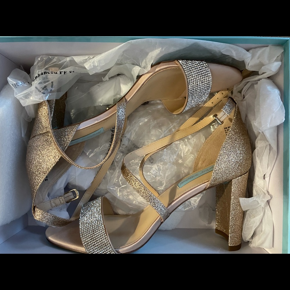 Never worn, Betsy Johnson champagne shoes.